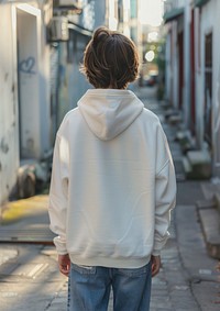 Young man wears blank white hoodie mockup hair sweatshirt clothing.