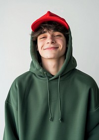 Man wears blank green hoodie and red cap mockup photography portrait smile.