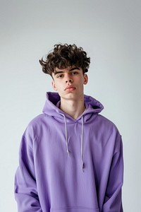 Young man wears blank purple hoodie mockup photography portrait sweatshirt.