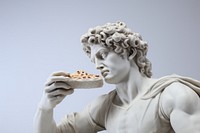 Greek sculpture david eating a pizza clothing apparel person.