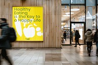 Yellow grocery store sign on wooden wall