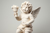 Greek sculpture cherub holding ice cream archangel clothing dessert.