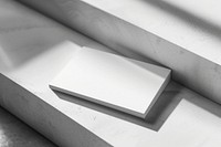 Business card mockup paper windowsill aluminium.