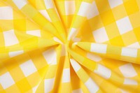 Yellow and white plaid fabric pattern.