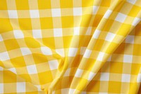 Yellow and white plaid pattern tablecloth.
