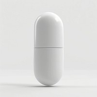 Powdered oval white pill with center line electronics medication porcelain.