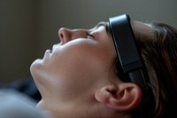 Sleep optimization headband person electronics headphones.