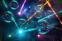 Soap bubbles floating through a smoky nightclub light lighting urban.