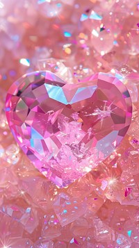 Pink heart shaped crystal festival mineral symbol.