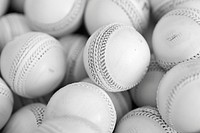 Lots of cricket ball sports confectionery baseball.
