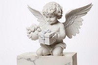 Close-up cupid Greek sculpture person holding gifts archangel figurine human.