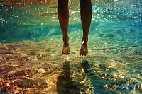 Legs on the underwater outdoors person nature.