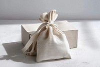 Small linen fabric bag with ribbon.