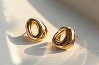 Gold earrings text accessories accessory.