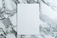 Closeup photo of a blank a4 paper mockup marble white board.