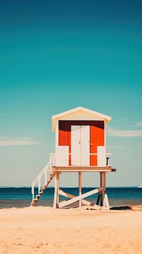 Photo of summer beach architecture countryside waterfront.