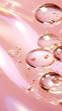 A pink background with water ripples droplet bubble.