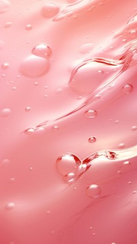 A pink background with water ripples blossom droplet jacuzzi.