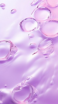 A purple background with water ripples droplet blossom flower.