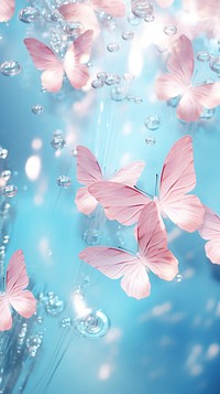 Light pastel blue butterflies outdoors blossom flower.