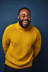 A Middle age black people waring yellow sweater knit laughing clothing knitwear.