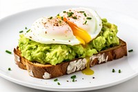 Mashed avocado toast with egg plate food.