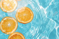 Summer background orange fruit water.