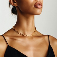 A gold necklace accessories accessory shoulder.