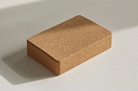 A yoga block brick.
