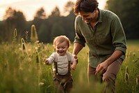 Baby boy is happy with his first steps baby person people.