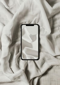 A mockup of a phone electronics cushion person.
