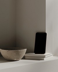A phone mockup bowl electronics windowsill.