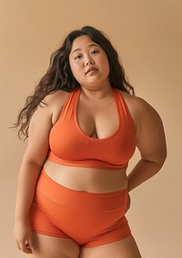 Asian chubby woman in brick orange activewear photo photography underwear.