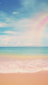 Minimal rainbow with beach shoreline outdoors horizon.