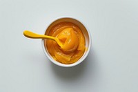 Smooth mango puree in bowl