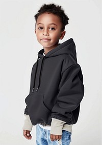 Child wearing black hoodie