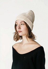 Stylish woman wearing knitted beanie