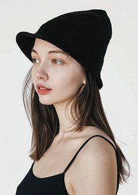 Stylish woman wearing black hat