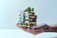 Modern sustainable architecture in hand