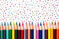 Colorful pencils with dotted background