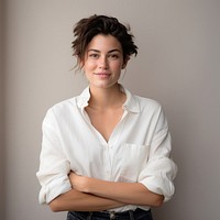 Confident woman in white shirt