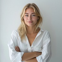 Confident woman in white shirt