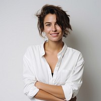 Confident woman in white shirt