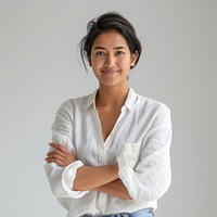 Confident woman in white shirt