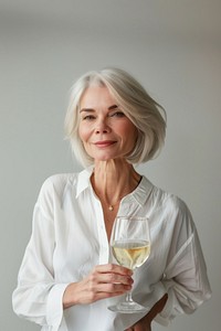 Elegant mature woman with wine