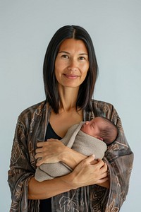 Mother holding newborn baby