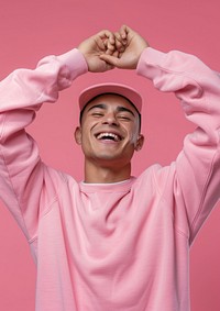 Joyful man in pink attire