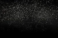 Falling snowflakes on black background