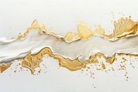 Abstract gold white paint splatter