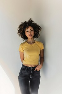 Curly-haired woman in yellow